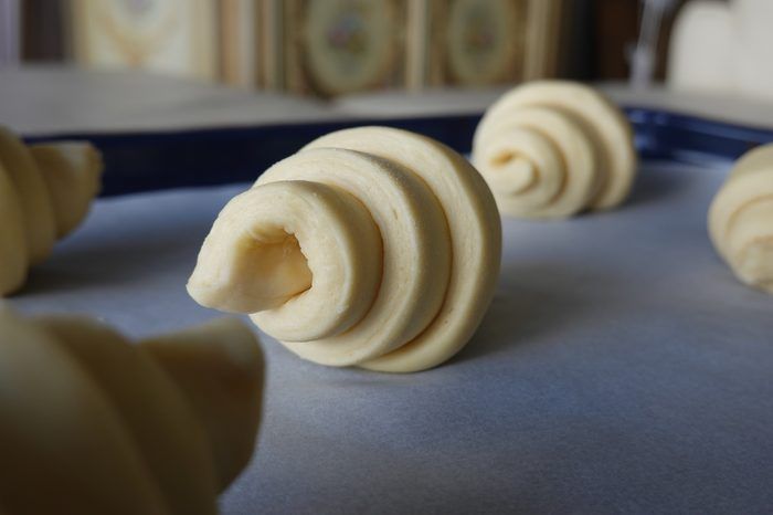 Freshly shaped croissant dough before proofing